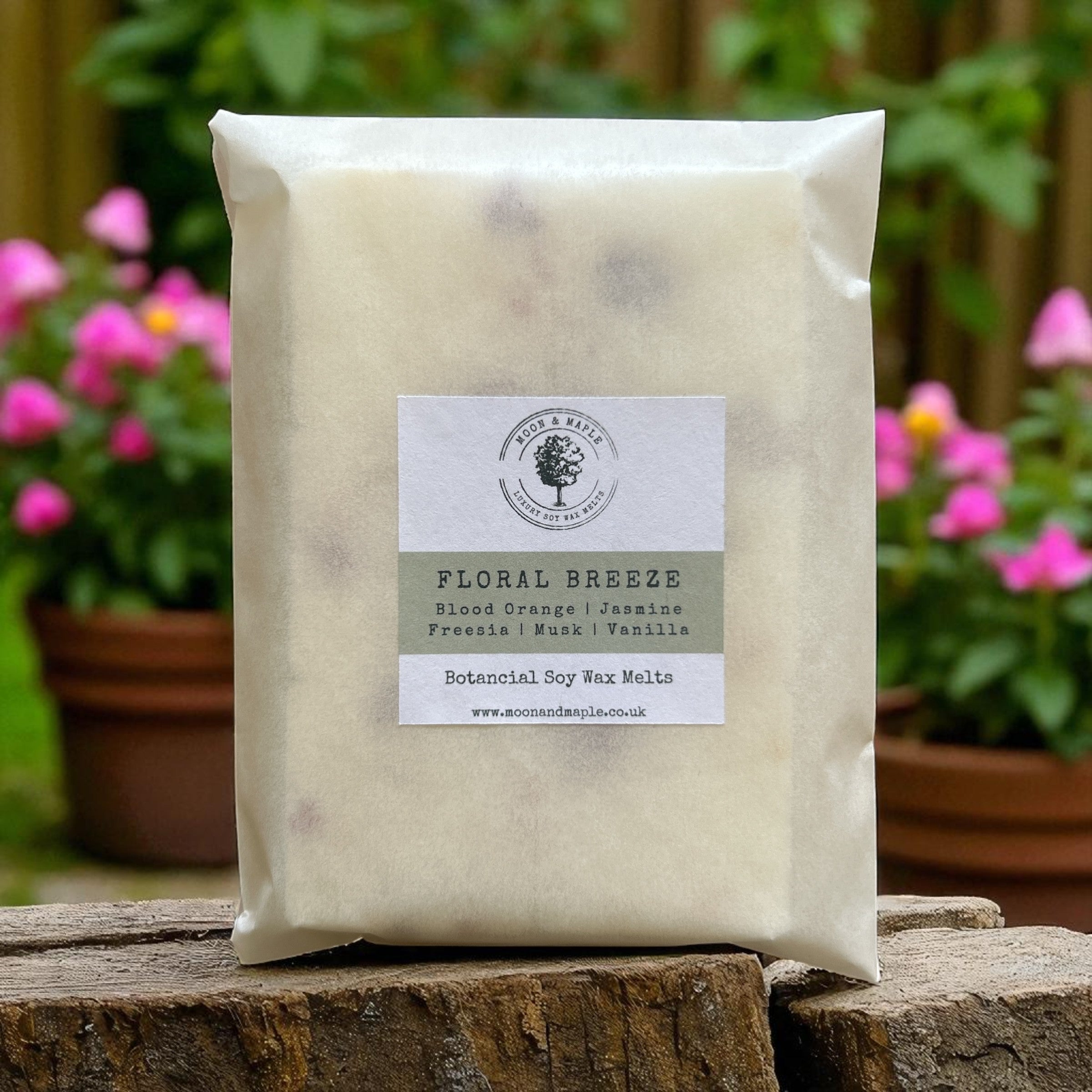 Packaged product labeled 'Floral Breeze' with a garden background