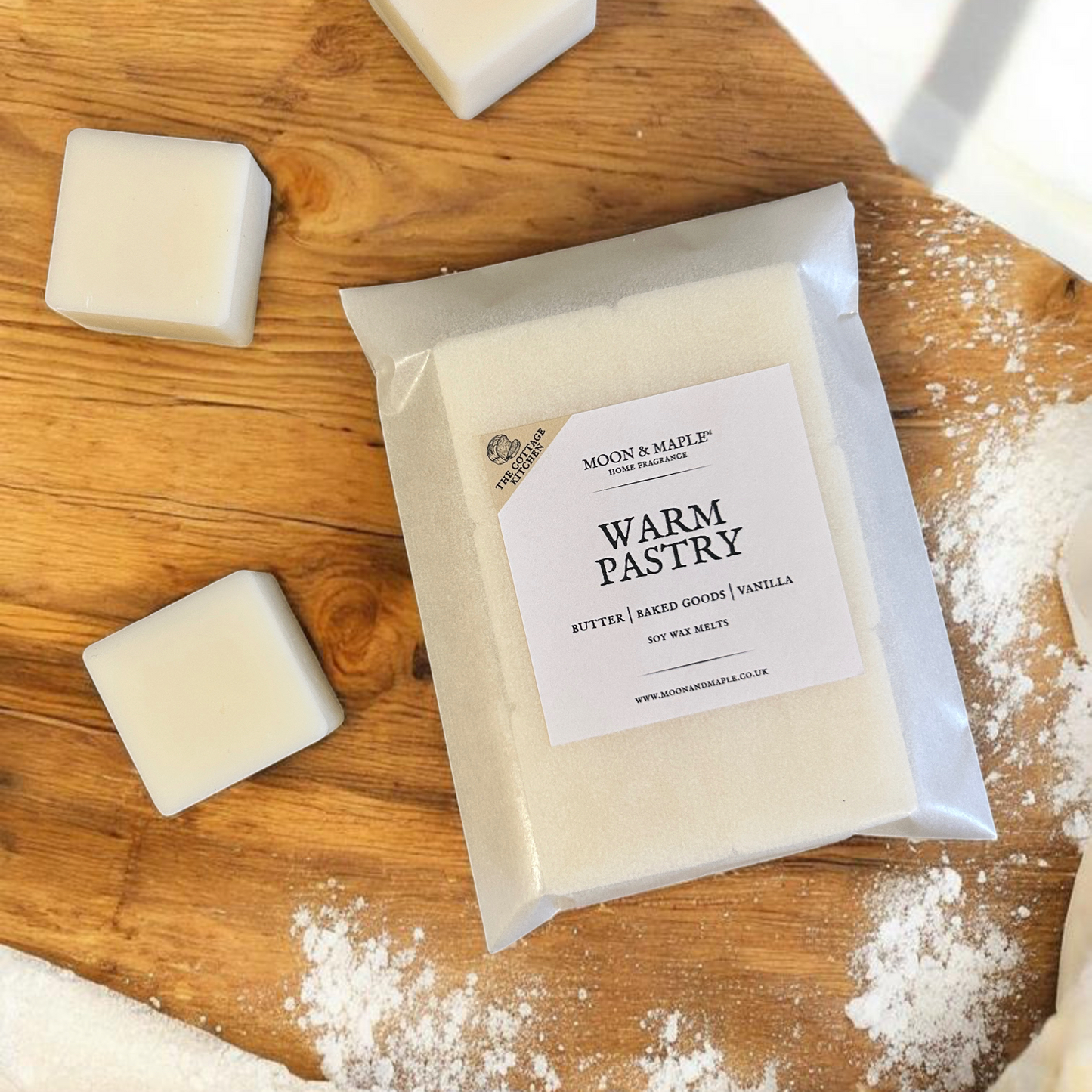 Warm Pastry soy wax melts on a wooden kitchen surface