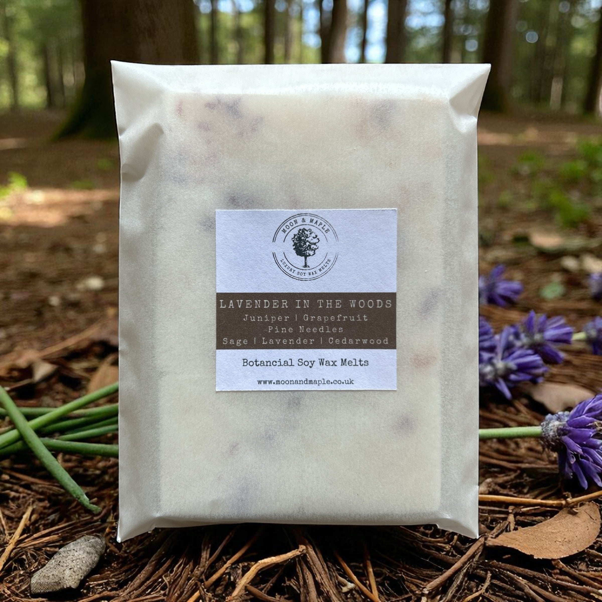 Packaged wax melts with a label on a natural background in a forest