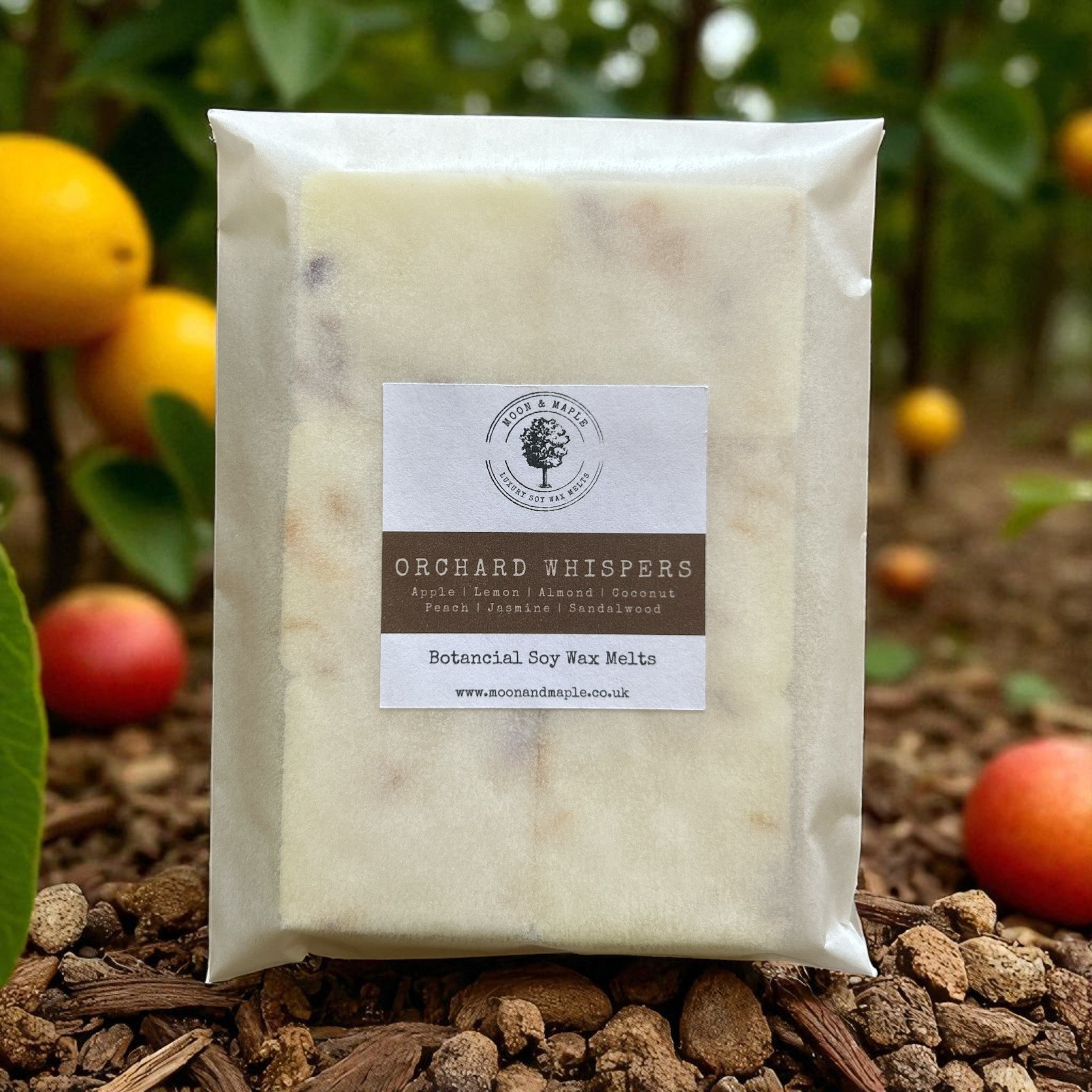 Packaged wax melts with a label on a natural background