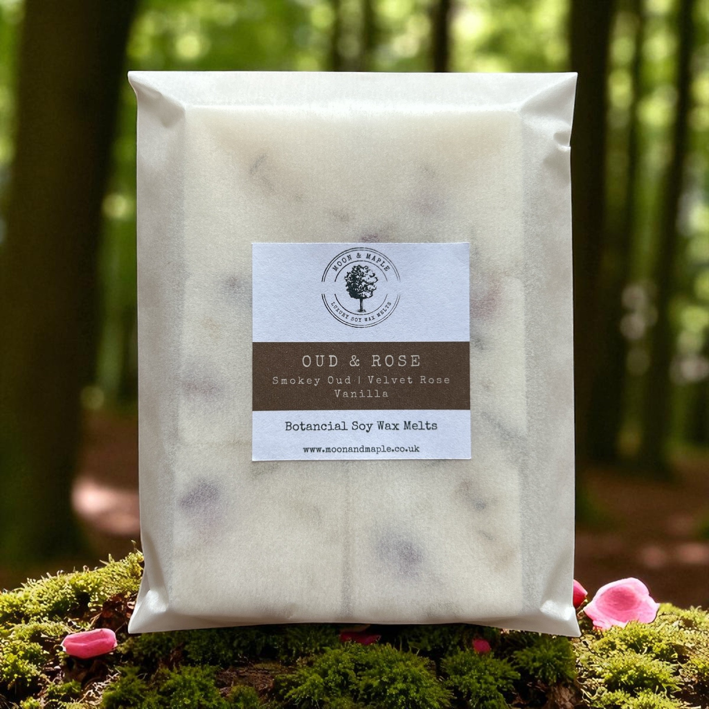Pack of Oud & Rose wax melts with a label on a natural background
