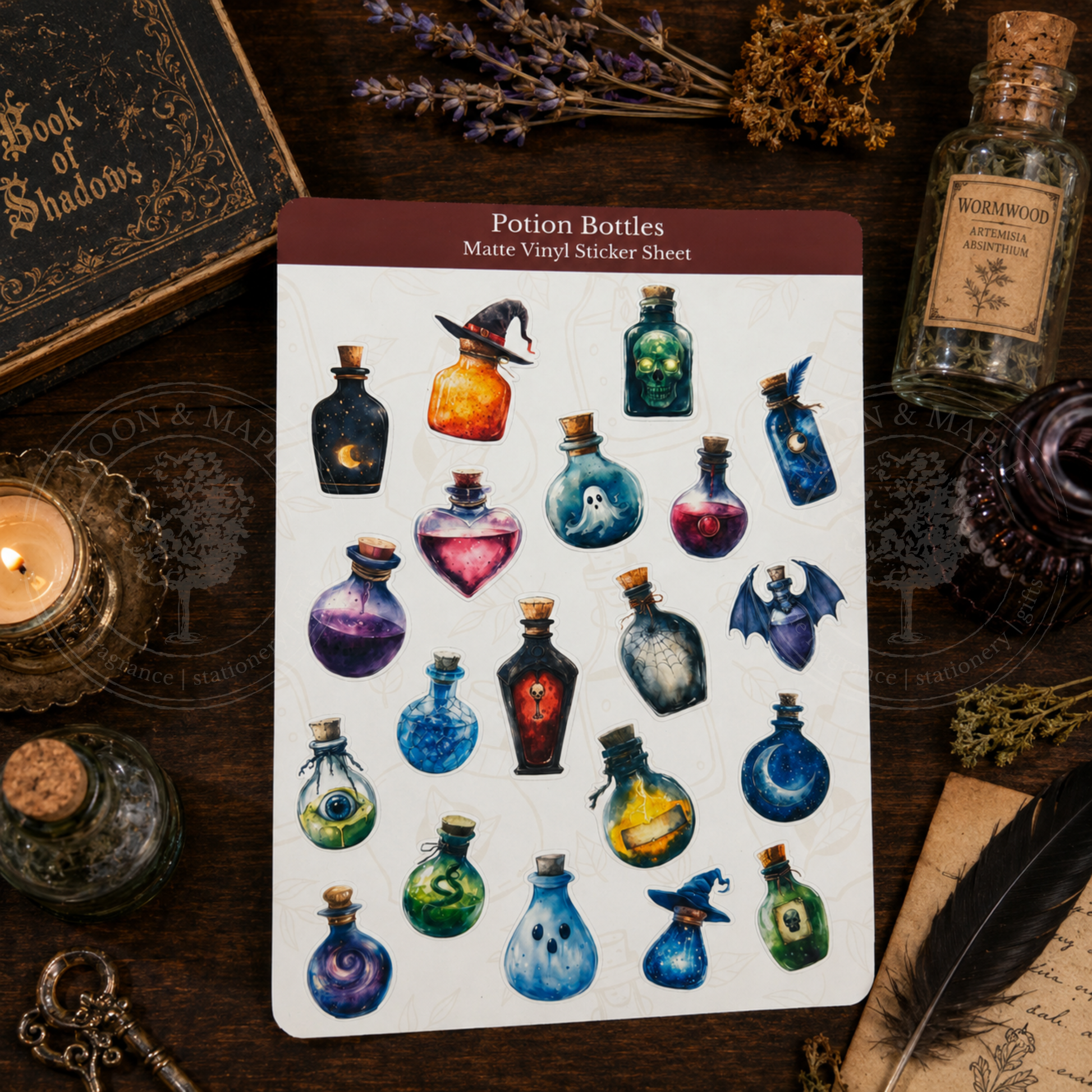 Sheet of potion bottle stickers on a dark surface with decorative items.