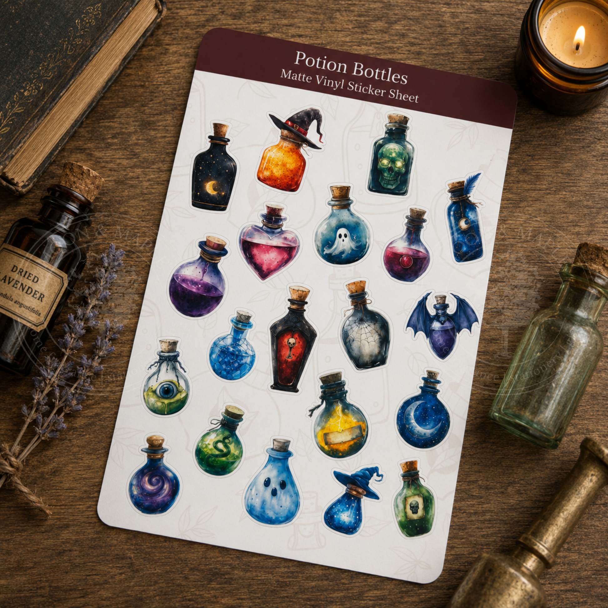 Sheet of potion bottle stickers on a wooden surface with decorative bottles and a candle.