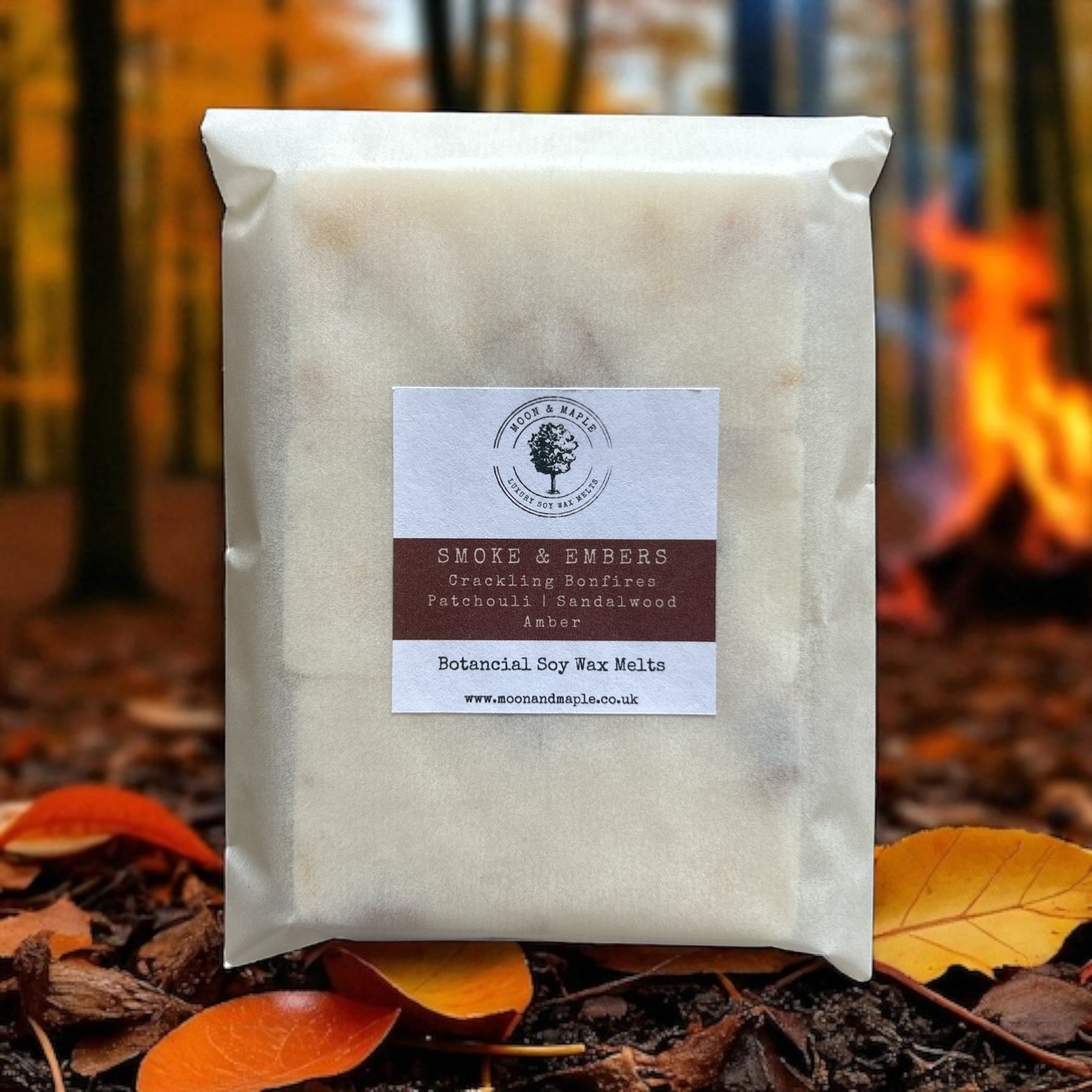 Packaged wax melts with a label on a forest background