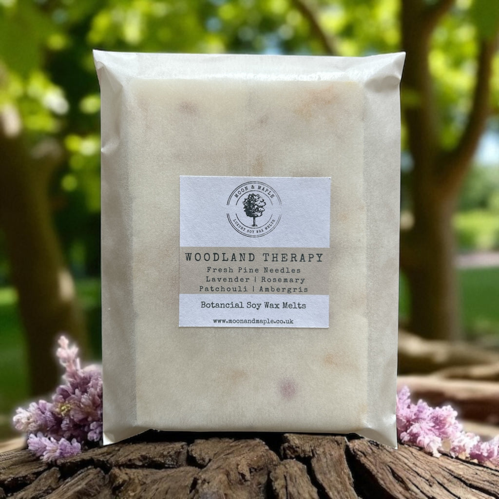 Pack of Woodland Therapy botanical soy wax melts with a natural background
